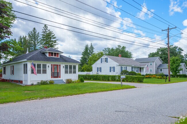 Many residents of Penacook maintain a patriotic spirit with American flags hanging in front.