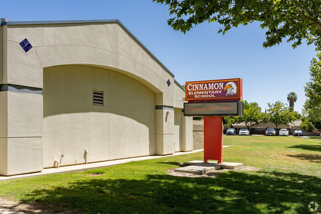 A lighted marquee at the entrance of Cinnamon Elementary School informs parents of events.