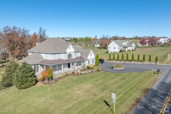Large estates line quiet roads in Skyland Estates, giving the community its name and character.