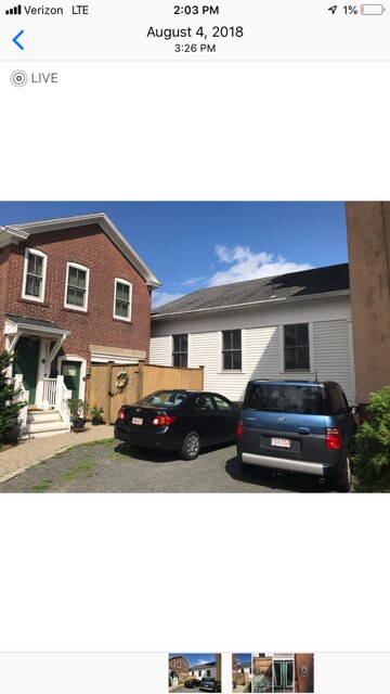 Front entry with private parking and private patio