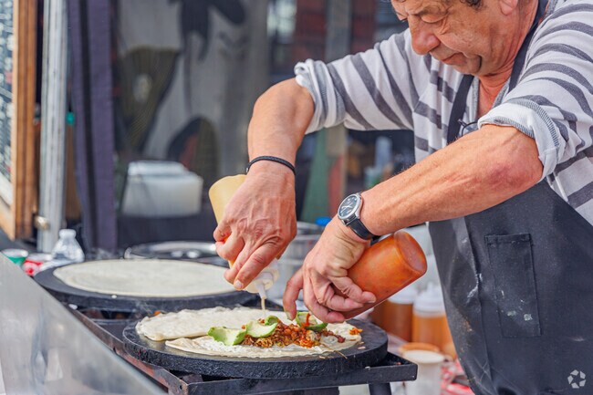 Street vendors serve up world-class dishes at the Hillcrest Farmers Market.