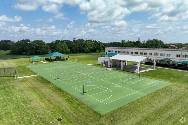 Basketball courts in the backyards of Elbridge Gale Elementary School.