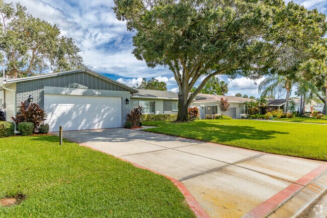 A row of the popular early 70's ranch style homes in Crossroads.