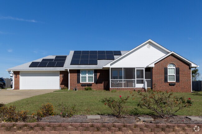 Some of the newer homes in Dalzell feature solar panels to reduce energy costs.