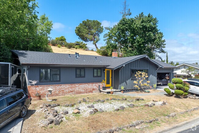 Clean lines and a bold accent door add fresh style to this classic Palos Verde Area ranch home.