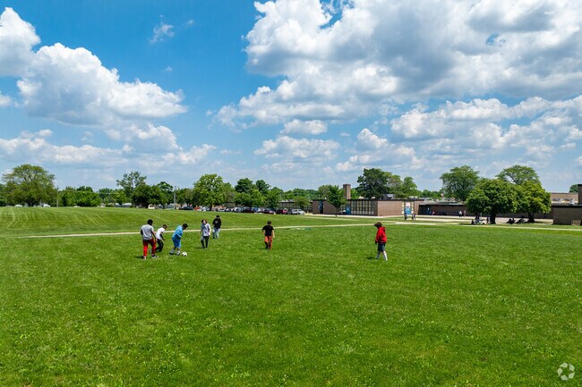 The children from Valleyview Heights enjoy playing soccer at Westmoor Park .