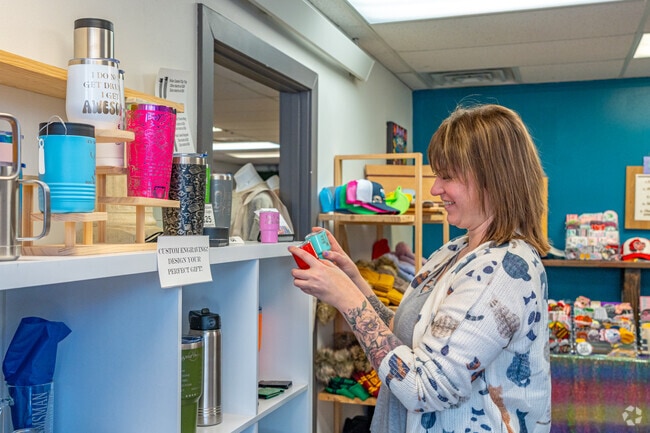 Residents shop for gifts at local stores in Country West.