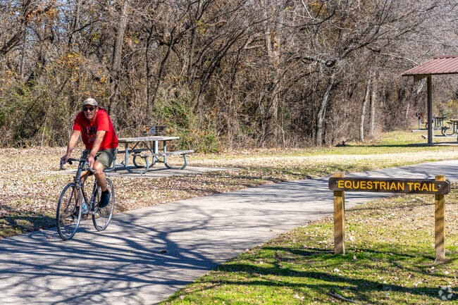 The Greenbelt Park near Aubrey and Savannah is perfect for riding a bike or hiking on trails.