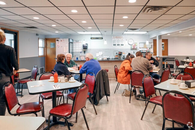 Enjoying an early dinner in the North Collins community.