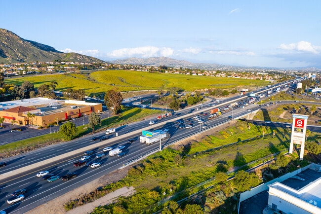 Navigate the scenic route along Freeway 60 near Cloverdale, Moreno Valley.