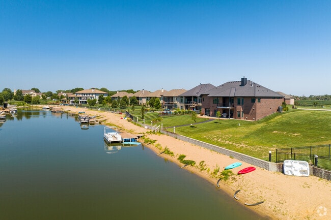 Moorings residences only have to walk a few feet from their home to enjoy sandy beaches.