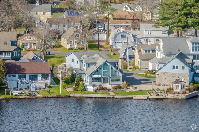 Beautiful homes near Sandy Beach in Crystal Lake, Ellington, Connecticut.