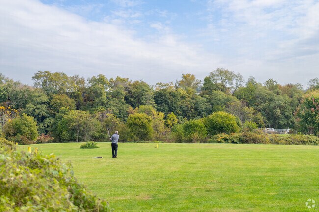 Practice your golf swing in the green space in Beaver Greens Park.