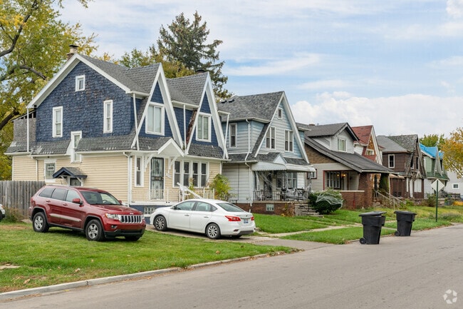 Large Tudors line the quiet streets of Von Steuben, Detroit.