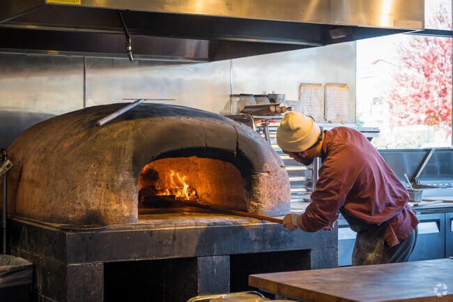 Versalia Pizza features woodfired pizza within the West Central Neighborhood.