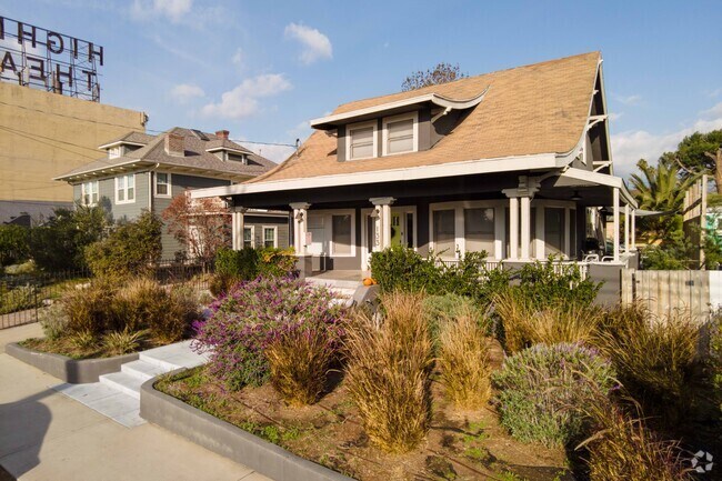 A row of homes on a quiet street in Highland Park, CA.