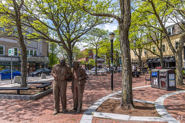 A statue of a couple sits at the heart of Davis Square.