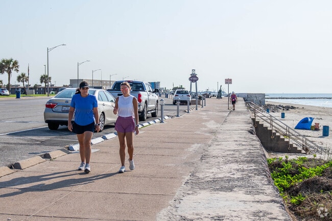 Fort Crockett residents exercise on the historic Galveston seawall, which spans miles.