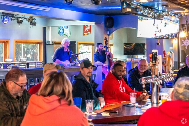 You can find live music at Daly's Bar and Grill near the Royal Oaks neighborhood.