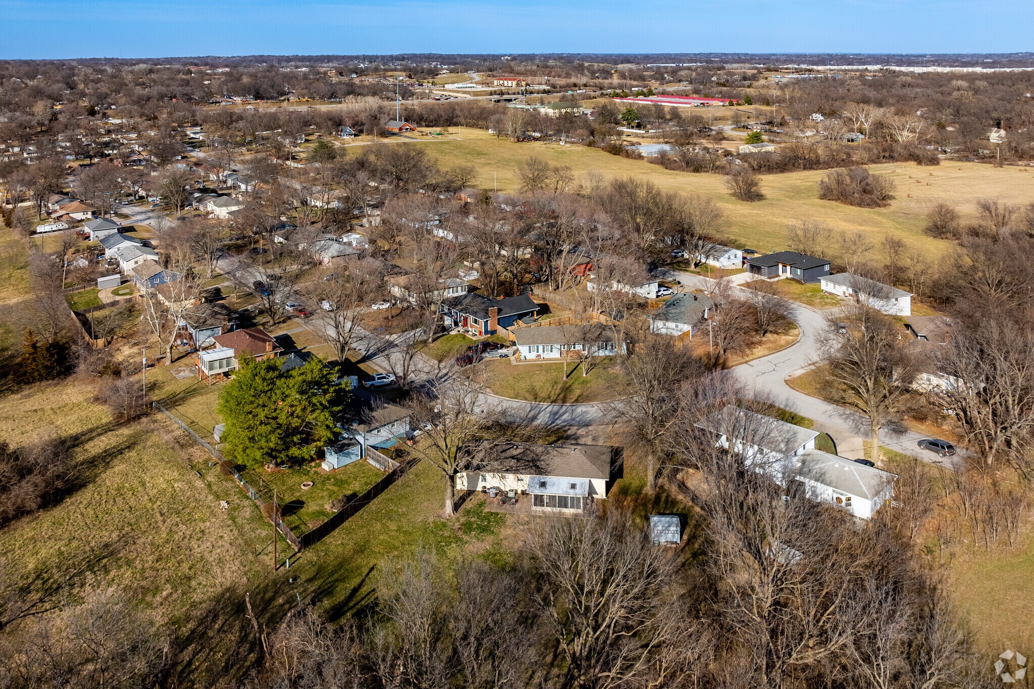Ranch style home line the wooded streets of Muncie.