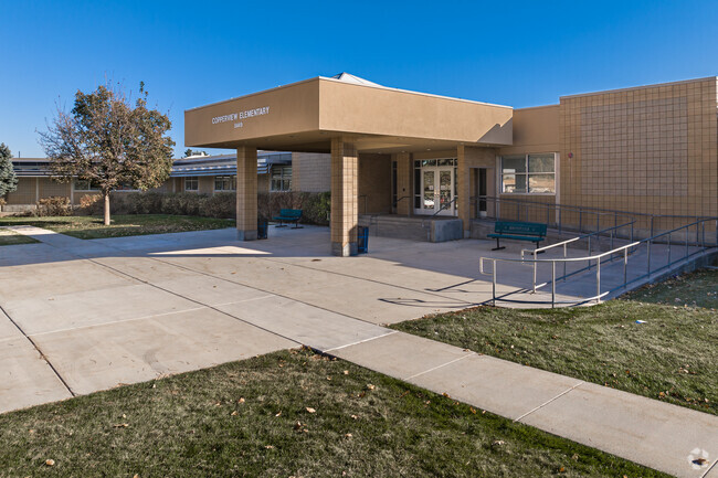 Copperville Elementary School's beige exterior stands out against the blue sky.