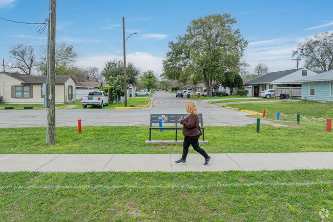 A woman takes a stroll at one of Galena Park's several parks.