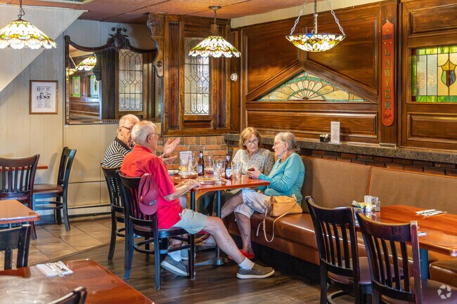 Ron’s Landmark welcomes locals and visitors alike with its vintage wood-paneled charm and stained-glass details that make Netcong dining feel intimate and timeless.