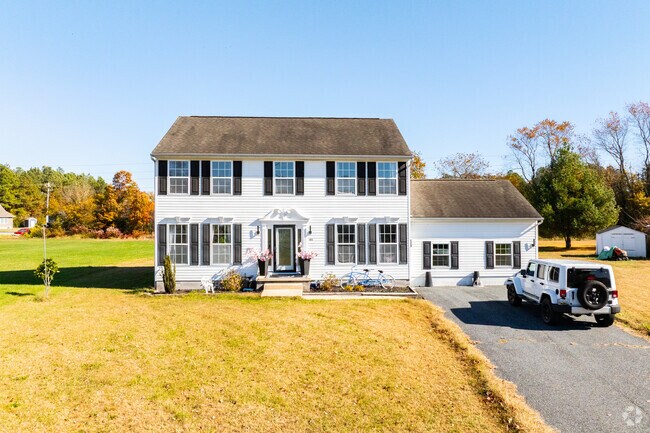 This charming colonial-style home offers timeless appeal in Hurlock.