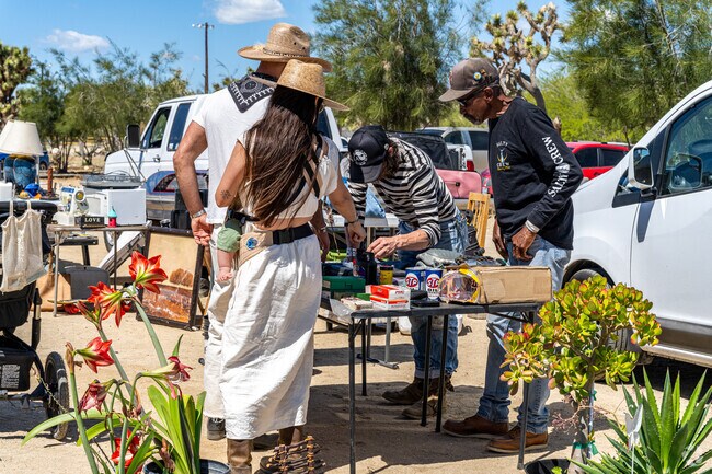 Yucca Valley locals and visitors go bargain shopping at the Sky Village Outdoor Marketplace.