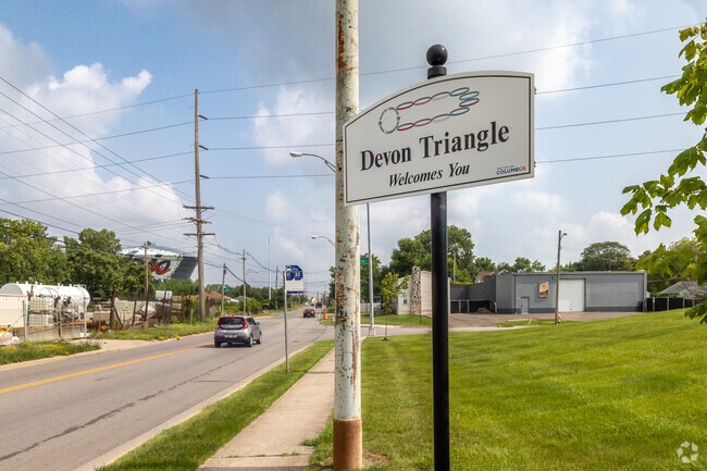 Devon Triangle welcomes visitors with this colorful sign as you enter the neighborhood.