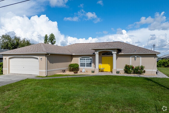Homes in Mariner sit on large lots with paved driveways.