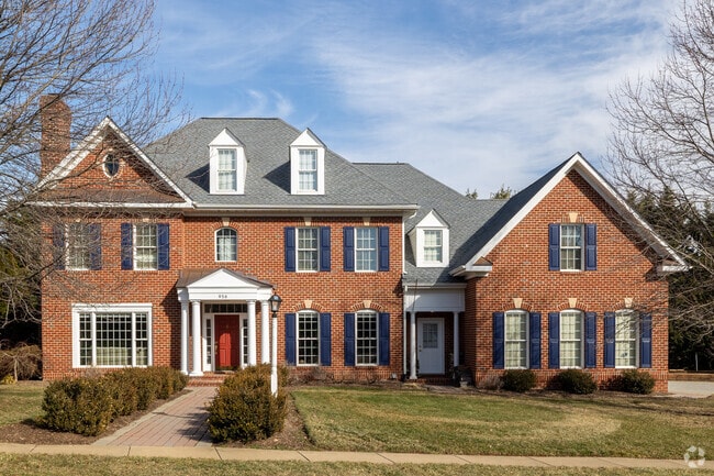 Traditional charming brick colonial revival is inviting to the Winchester neigborhood.
