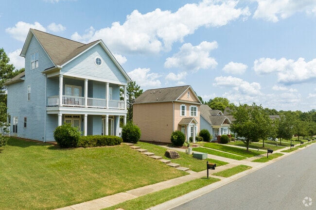 Beautiful homes with well maintained yards are seen throughout Arbor Glen.
