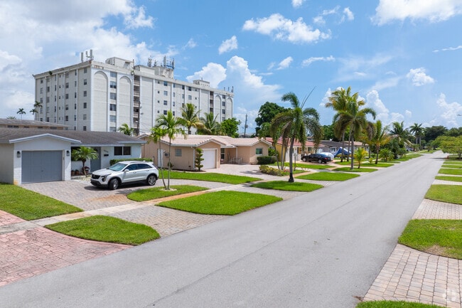 Admire the neat row of homes in Lawn Acres, each with its unique character and style.