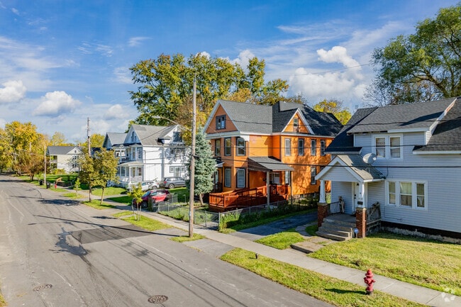 Homes in Elmwood are primarily traditional two-story styles, including American Foursquares, bungalows, and colonial-style houses.
