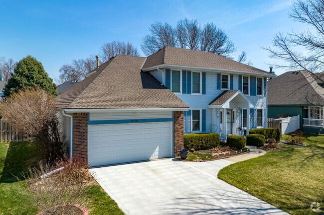 South Elkhorn offers split level homes with attached garages and well-maintained lawns.