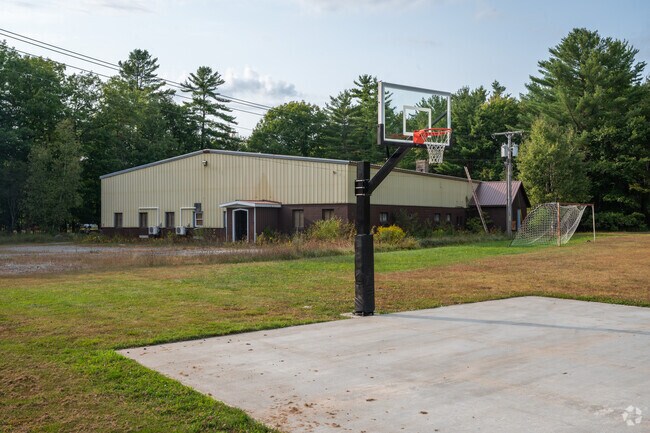 Knock down jump shots on the court of Highborn Middle School.