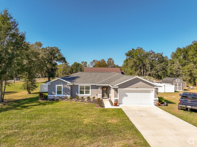 A lovely, ranch style home in a suburban neighborhood  of Ocklawaha, Fl.