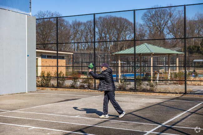 Play a game of paddle ball at Christopher Morley Park in Roslyn Heights.