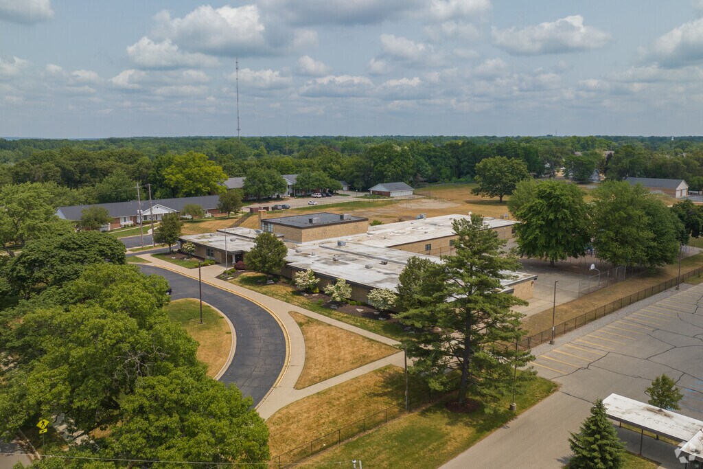 Aerial context of Plymouth Grace Christian Academy school on Ball Ave in Grand Rapids, MI.