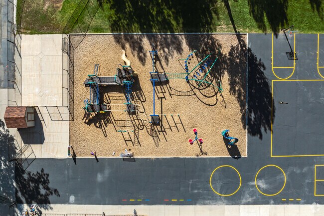 McPolin Elementary School has a colorful playground padded with wood chips.