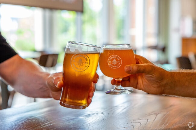 Raise a glass with friends at Faubourg Brewing Co., minutes from Plum Orchard.