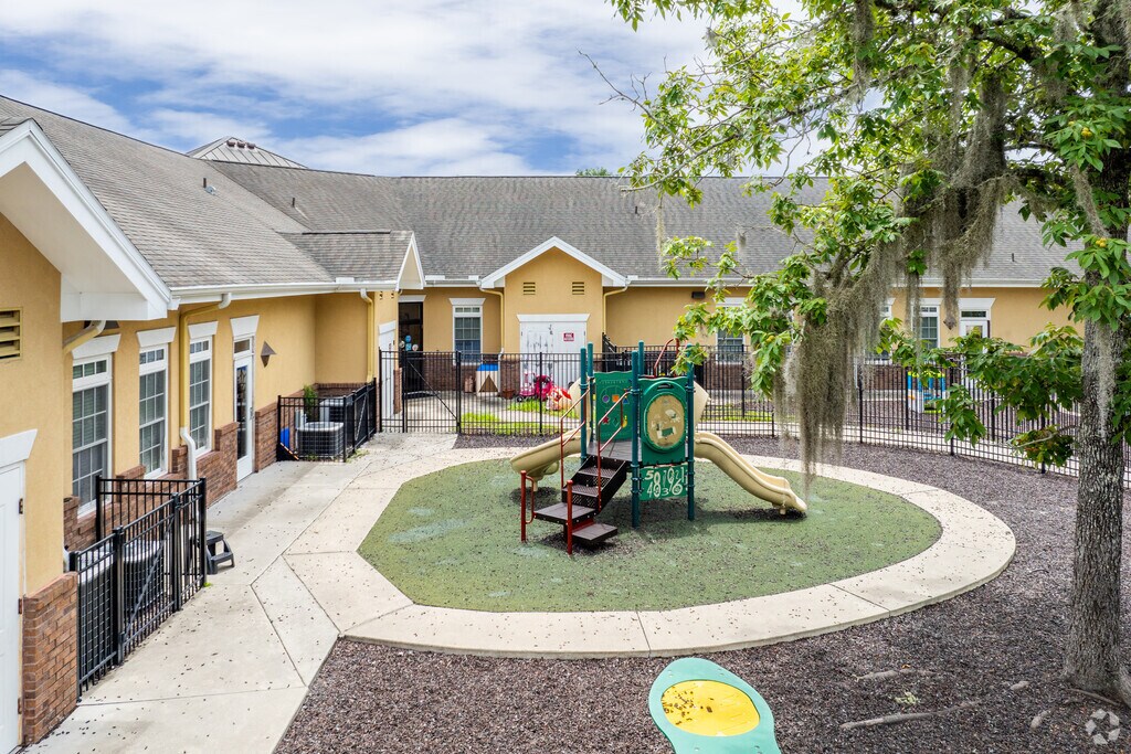 Students enjoy the playground at the Kiddie Academy of Gainesville.