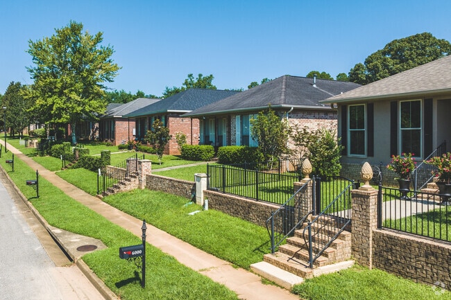 One might find cozy patio homes in Westhill, neatly built on elevated lots.