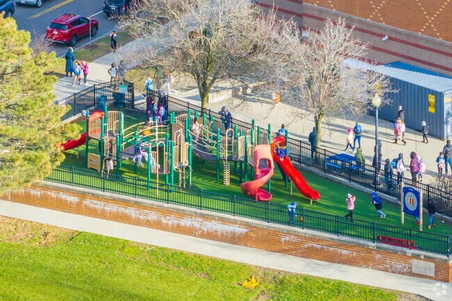Kids love to run around the playground at Newman Park in Belmont.