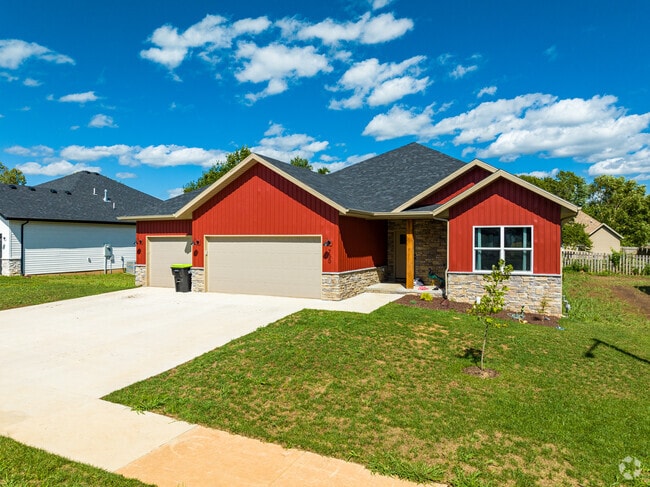 Modern homes in Republic blend ranch and Tudor influences and feature natural stone.