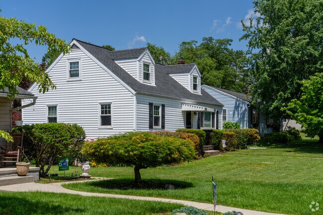 Cape Cods boast strong curb appeal with fun landscaping and bright colors in Highland Park.