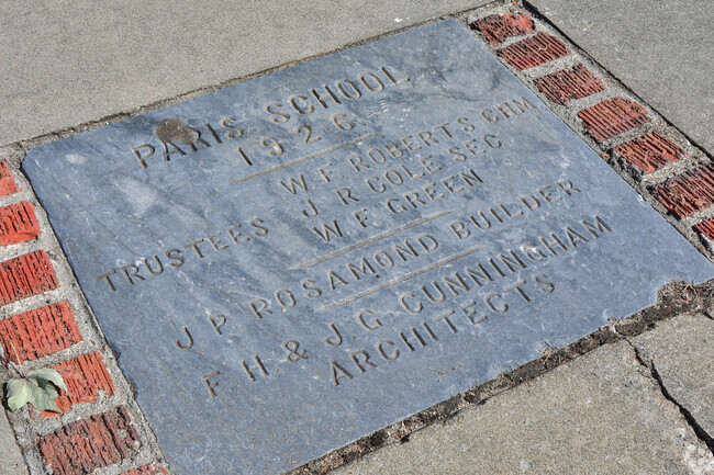 Paris Elementary School history marker stamped on the sidewalk in North Greenville.