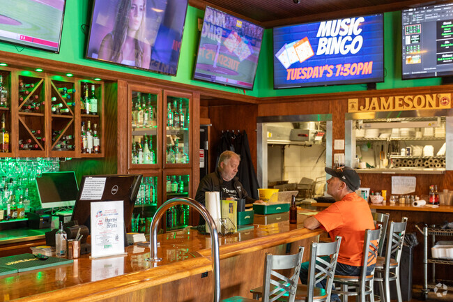 Maloney's Pub offers classic American fare for you in Central Delhi.