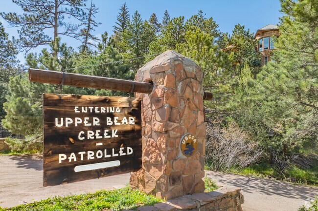 Since the late 1800s, Upper Bear Creek has been a treasured mountain retreat near Evergreen, Colorado. Its rich history of early settlers and conservation efforts paved the way for the stunning wilderness and close-knit community that thrive here today.